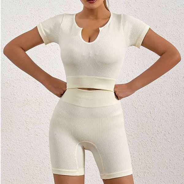 2-piece women's workout set with seamless leggings, sports bra, and high-waist shorts