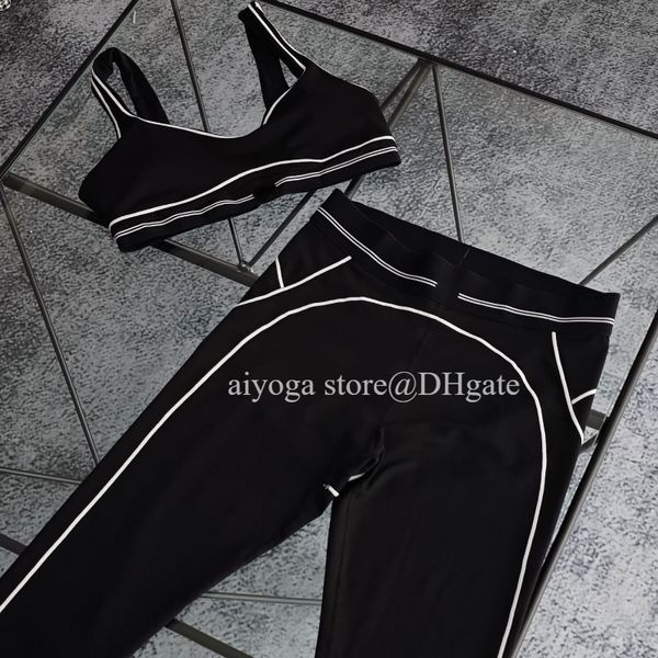 A stylish seamless top set with a heart-throb bra and leggings, featuring high-end white stripes and a low back design for summer dance, yoga, and running