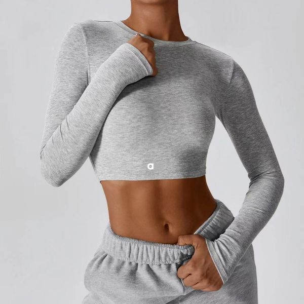 Aloyoga's lightweight long-sleeved fitness tee for running and yoga, a slim-fit top from Alosweats collection