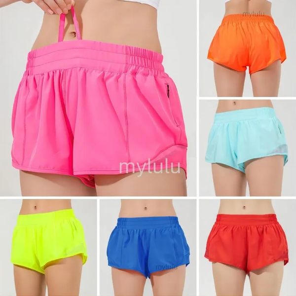 Breathable low-rise women's yoga shorts with quick-dry fabric, hidden side zippers, and drop-in pockets for running and workouts