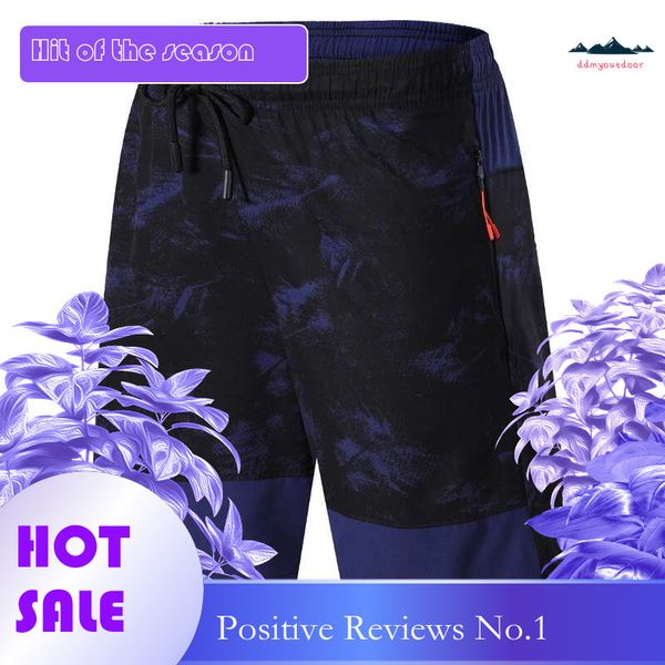 China's quick-dry running shorts for men, featuring breathable fabric, drawstring waist, zippered pockets, and a loose camouflage design for gym and jogging