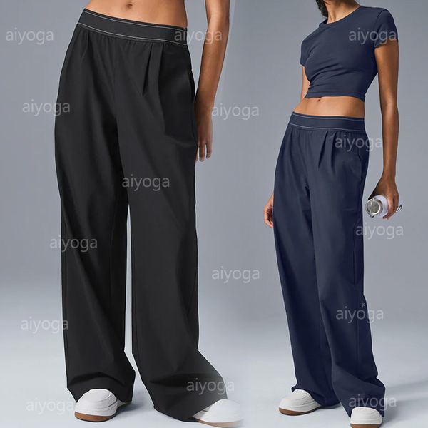 Designer sweatpants with a high-waist, loose fit, straight-leg silhouette, and elastic waistband for a casual, sporty look