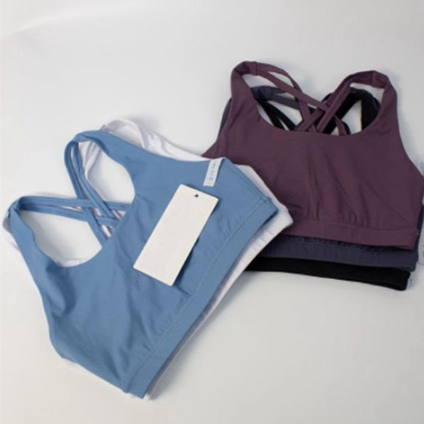 High-quality women's fitness bra with cross-back design, soft yoga tank top featuring chest pads for high-impact workouts