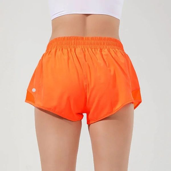 High-waisted athletic shorts with built-in liner and zippered pocket, perfect for running, gym workouts, yoga, and summer activities