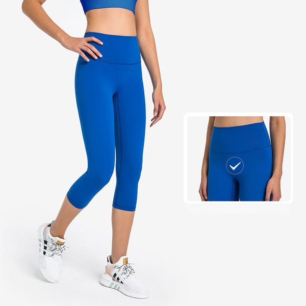 High-waisted cropped yoga pants in slim fit, solid color leggings with elastic waistband for women