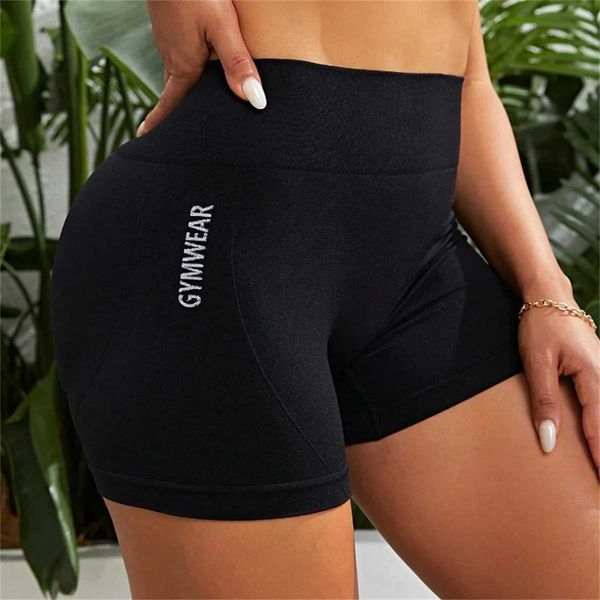 High-waisted sports shorts with butt-lifting design, stretchy, quick-drying, and breathable for yoga and workouts