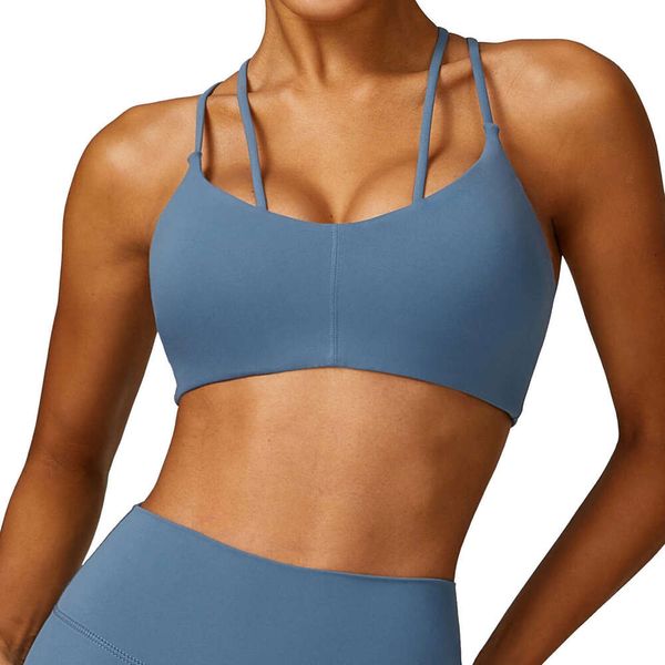 High-waisted yoga leggings with stylish back design, matching sports bra, and breathable fitness tops for outdoor running and workouts