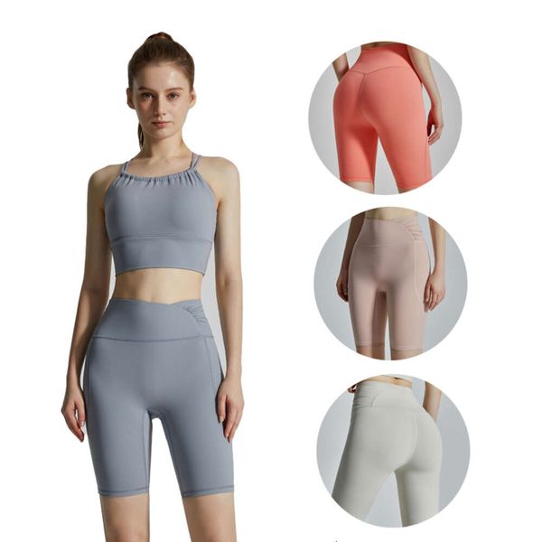 High-waisted yoga shorts for women with tummy control, seamless front, and wrinkle-free design for workouts and running