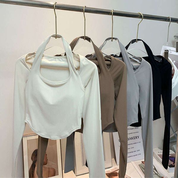 Inside Padding Long Sleeve Yoga Clothes Fiess Gym Top For Women Training Running Sexy Elastic Sports Blouses

Long-sleeved yoga top with inner padding for women, ideal for gym workouts, running and sports with stretchy fabric