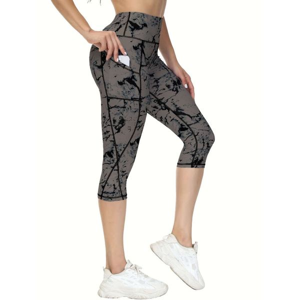 Leggings for women featuring a high waist, pockets, and soft black fabric, ideal for yoga, running, and workouts