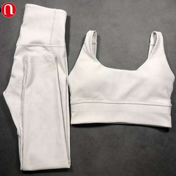Lemon yun Women's fitted yoga outfit with ribbed fabric, full-length leggings, sports bra, and matching set for workouts