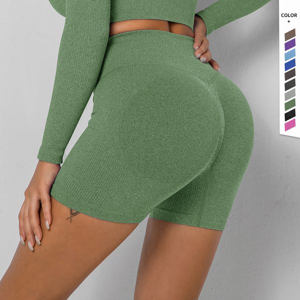 New seamless knitted fitness yoga wear featuring high-waisted peach hip running shorts for women