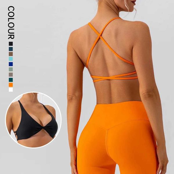 SHINBENE front-twist sports bra with cross-back straps for yoga and fitness, featuring a sexy sleeveless short top design H250111