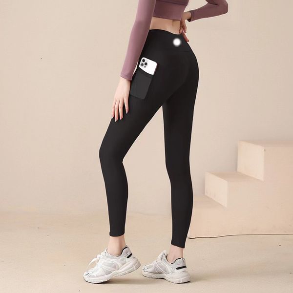 Solid color women's yoga leggings with high waist, elastic sports pants for fitness and outdoor activities, skin-tight design