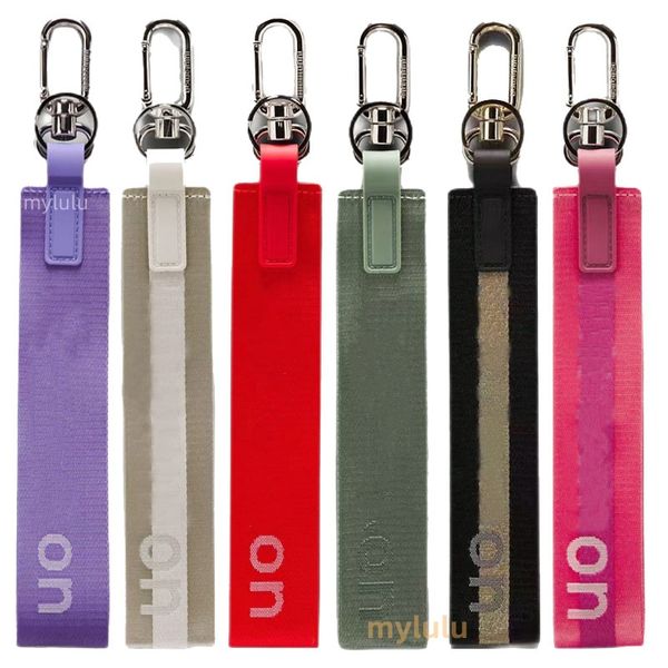 Stylish elastic wrist strap keychain for yoga, fitness, and running, also works as a hairband
