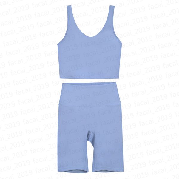 Two-piece women's yoga set with Y-back sports bra and high-waisted leggings for gym workouts