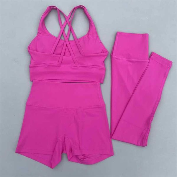 Women's 3-piece yoga set with cross-strap sports bra, high-waist shorts, and leggings for gym workouts and running