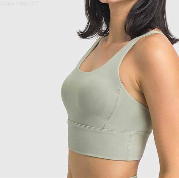 Women's fitness bra top with a crew neck, skin-friendly tank vest for breathable, quick-dry workouts and female sportswear featuring a crisscross design