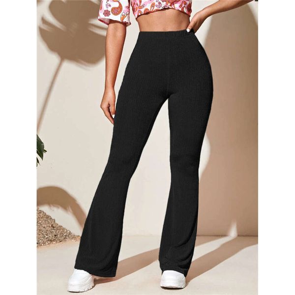 Women's fitness leggings with push-up effect, high-waisted yoga tights for workouts, casual gym wear, and flared leg design