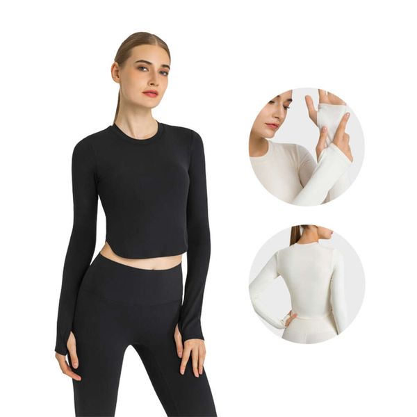 Women's fitted long sleeve yoga tops with padding, curved hem for casual and fitness wear