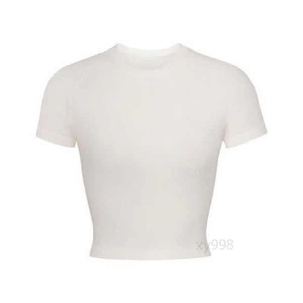 Women's fitted short-sleeve cotton T-shirt with elastic trim, cropped round-neck top showing midriff