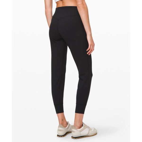 Women's high-waisted leggings for casual sports, yoga, and workouts with stretchy fabric, pockets, and ideal for running or gym jogging