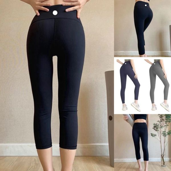 Women's high-waisted solid color yoga leggings with elastic fabric for fitness and outdoor sports
