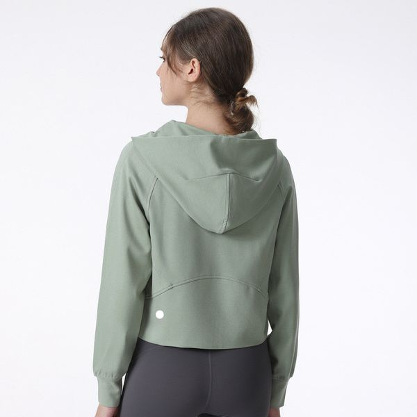 Women's hooded yoga jacket with long sleeves, solid color design, back zipper, waist-shaping fit, ideal for gym workouts and jogging