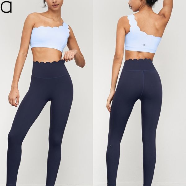 Women's lace fitness bra with shockproof support, high-waisted tights, and peach-enhancing booty shorts set