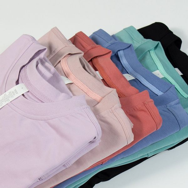 Women's long-sleeve loose round-neck sweatshirt for yoga, running, gym, or casual wear in spring and autumn seasons