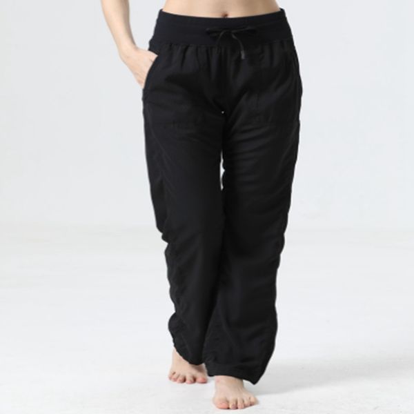 Women's loose full-length gym pants for workouts, running, and exercise with wide legs and stretch fabric