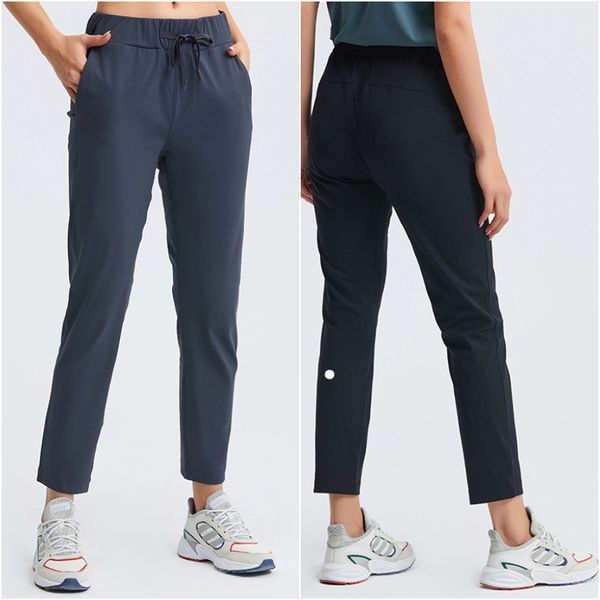 Women's loose yoga pants for exercise, gym, running, and casual wear with elastic high waist and drawstring