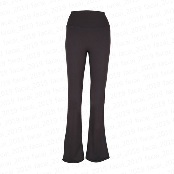 Women's nude-colored yoga pants with a shaping waistband, flared legs, and loose fit for jogging and fitness activities