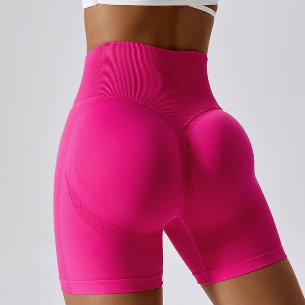 Women's seamless yoga pants with hip-lifting design, high-waisted peach fitness leggings for running and sports