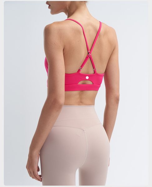 Women's shockproof cross-strap sports bra for yoga, running, gym workouts, and fitness with free push-up support