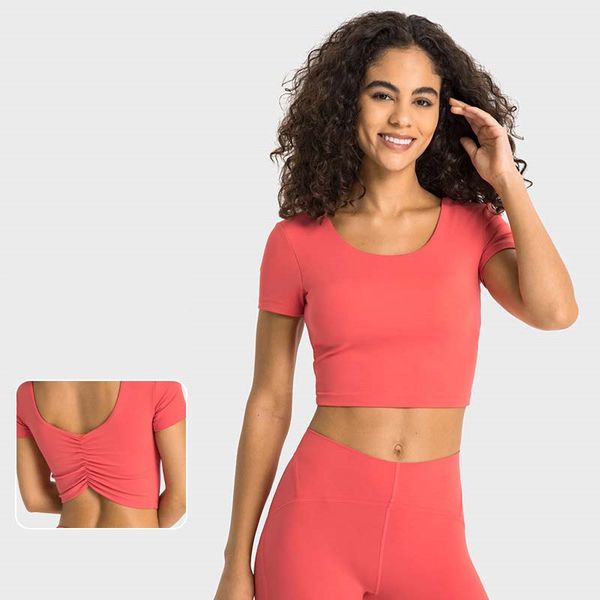 Women's short-sleeve yoga crop top with built-in pads for sports and fitness