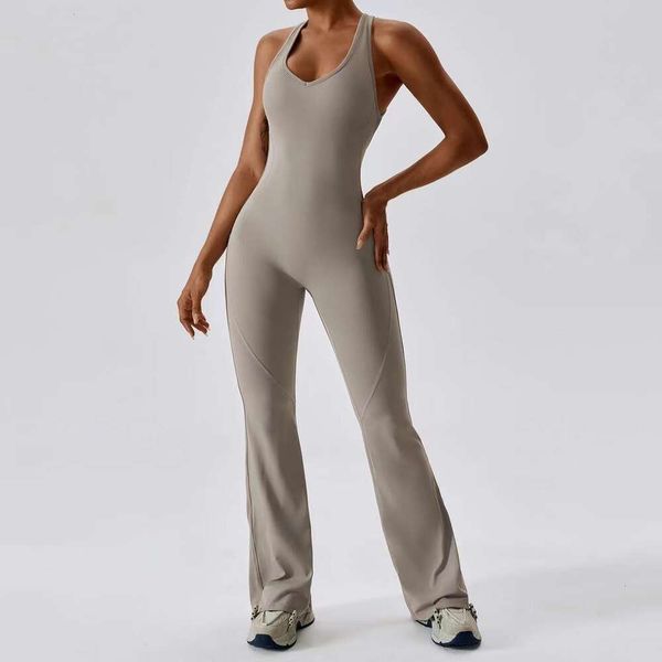 Women's sleeveless fitted jumpsuit set for yoga and dance, featuring long quick-dry breathable pants