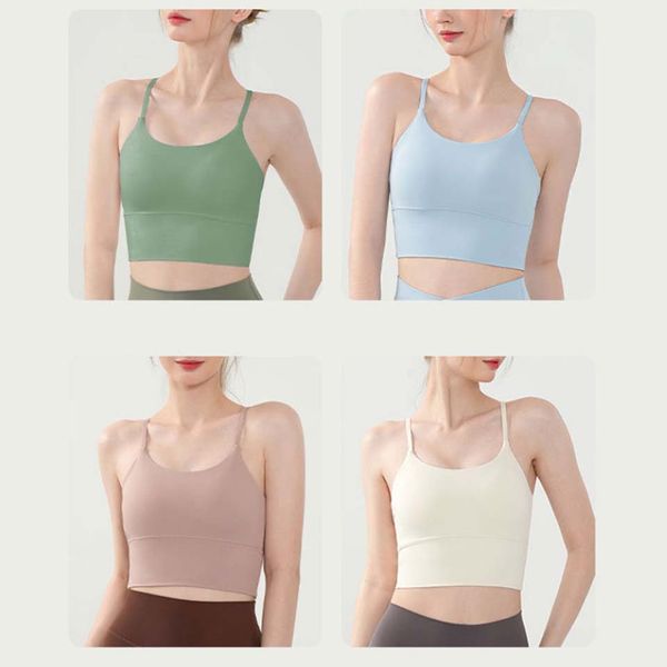 Women's slim-fit yoga vest with cropped spaghetti strap design in solid colors like blue, pink, green, and white