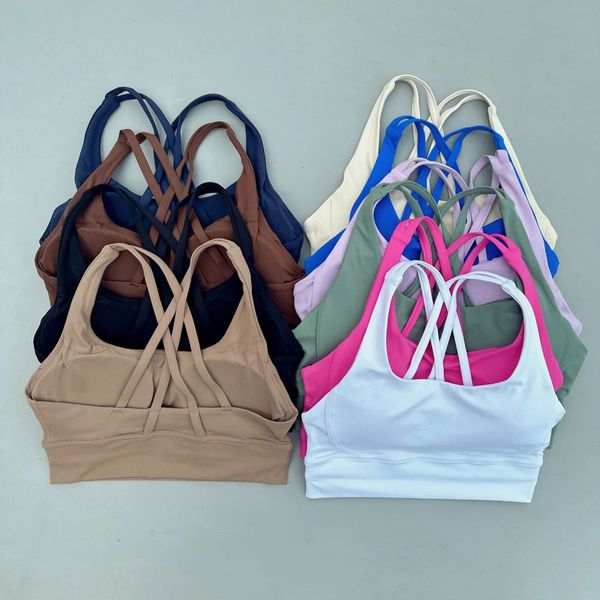 Women's sports bra with cross-back straps for yoga, fitness, gym workouts, running, and cycling