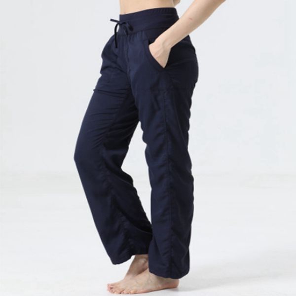 Women's stretchy full-length yoga pants with pockets for workouts, running, and exercise