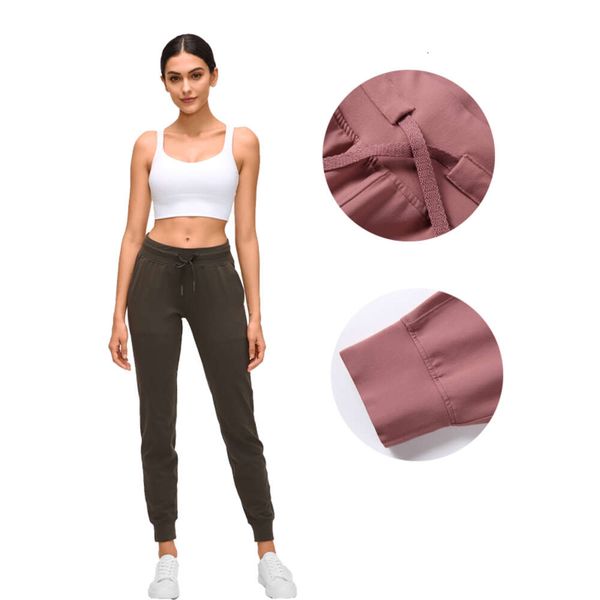 Women's stretchy joggers with pockets, comfortable elastic waistband for workouts, sports, gym, lounging, yoga, running, and athleisure wear