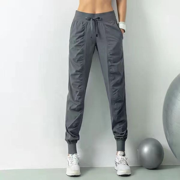 Women's stretchy slim-fit yoga joggers for running and workouts with loose sweatpants design