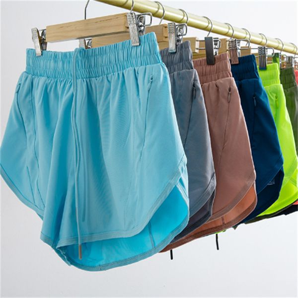 Women's stretchy yoga shorts with pockets for running and sports, quick-drying and comfortable