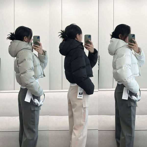 Women's stylish cropped puff jacket with high waist, featuring 90% goose down in three-grid design