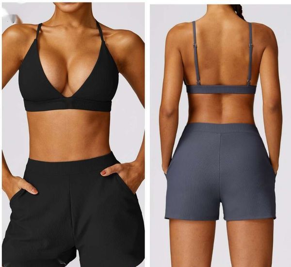 Women's stylish yoga set featuring a snug sports bra and quick-dry shorts for running and fitness