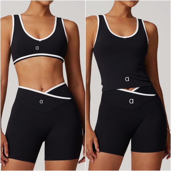 Women's two-piece yoga set with sleeveless vest, high-waist shorts, and elastic sportswear for gym and running