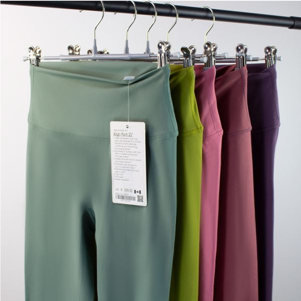 Women's yoga pants for sports with high-waisted design, hip-lifting fit, and nude color for gym workouts