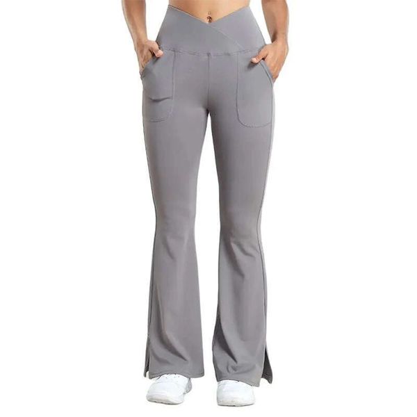 Women's yoga pants with pockets, crossover waist, and split hem for workouts