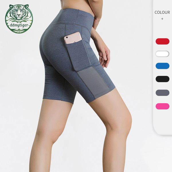 Women's yoga shorts featuring side pockets for workouts, snug elastic fit, quick-drying and sweat-wicking capris