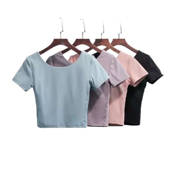 Women's yoga tops with built-in chest pads, snug and stylish U-neck running tees in nude, short-sleeved for fitness